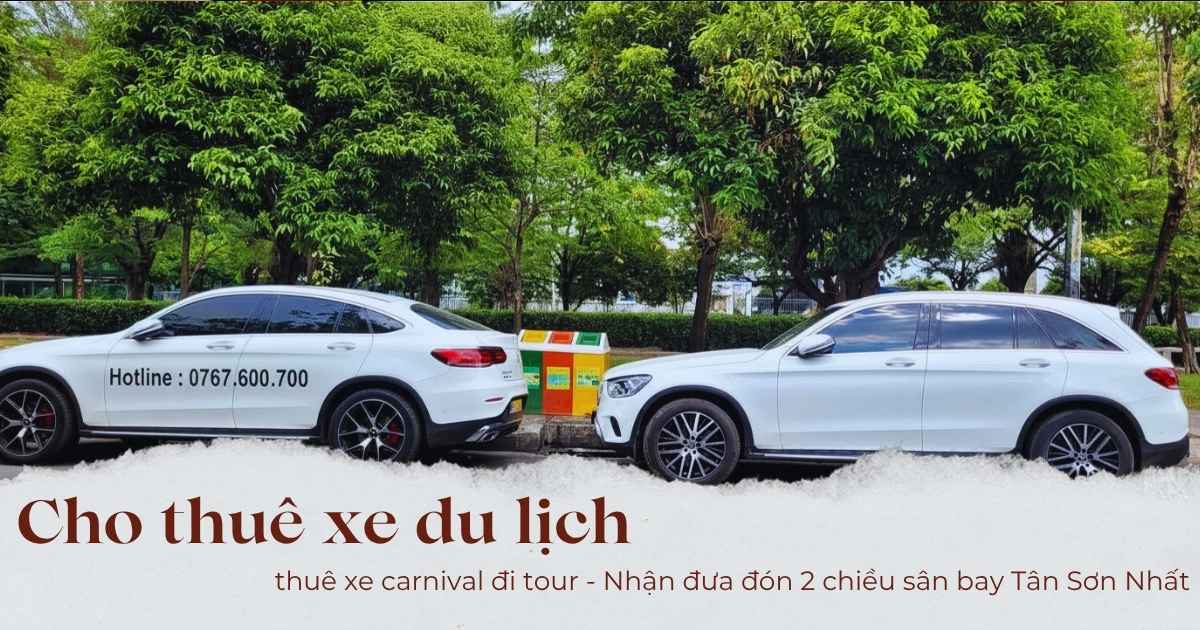 a white car parked next to a colorful box